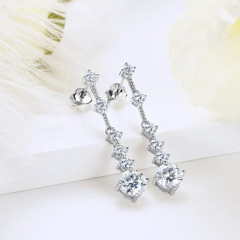 Moissanite dangle earrings with 3ct VVS1 stones, silver tassel design by HSF Marketplace