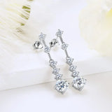 Moissanite dangle earrings with 3ct VVS1 stones, silver tassel design by HSF Marketplace