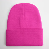 Unisex soft knitted winter beanie hat in a solid color, available in 24 color options