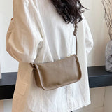 Genuine cowhide leather crossbody handbag for women with high capacity, stylish purse, and shoulder strap, black color, HSF Marketplace.