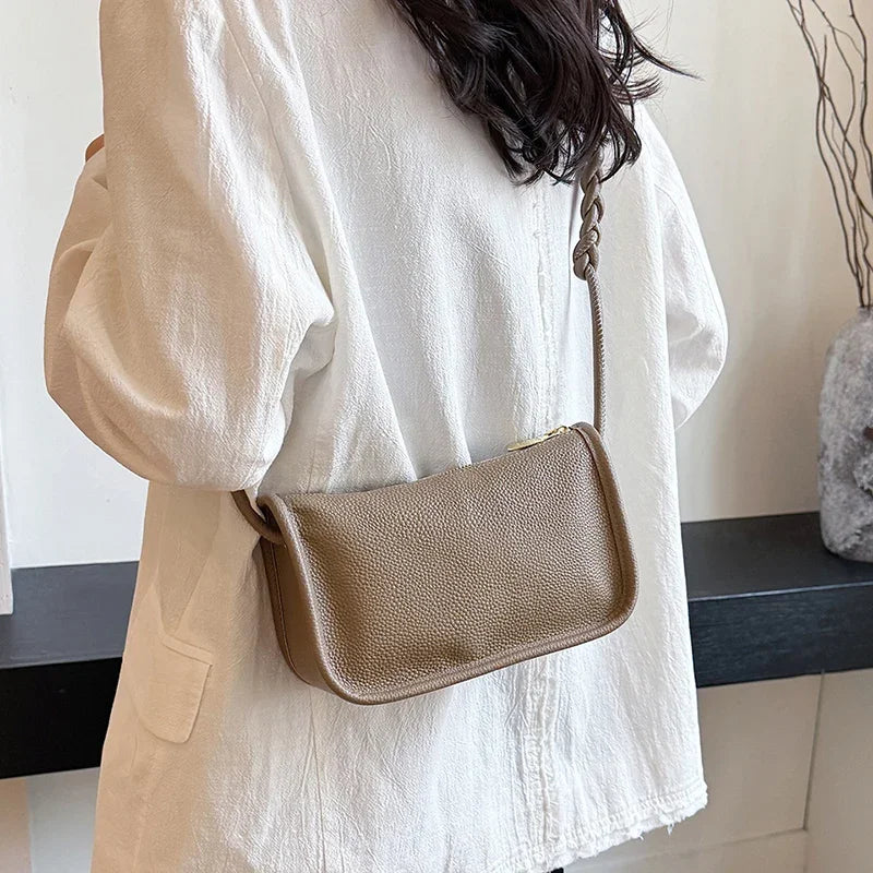 Genuine cowhide leather crossbody handbag for women with high capacity, stylish purse, and shoulder strap, black color, HSF Marketplace.