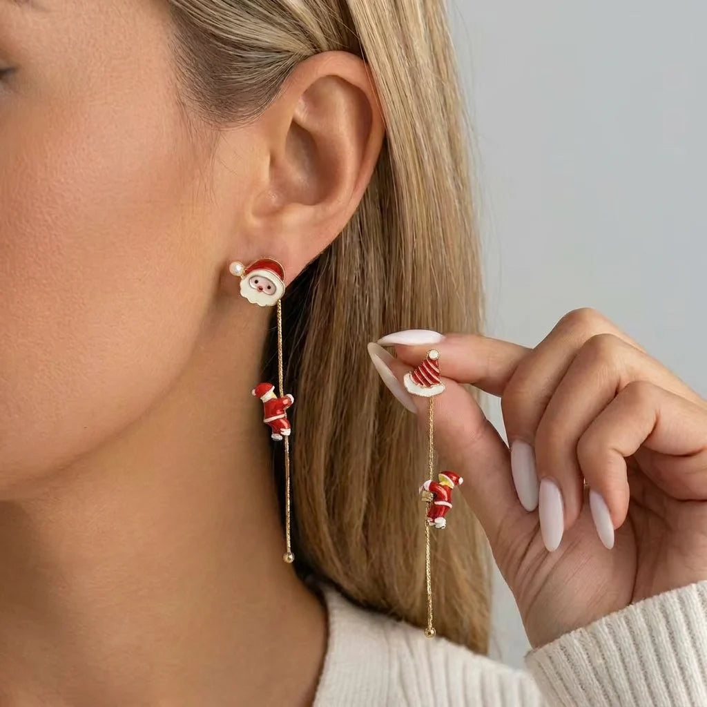Moving Santa Claus tassel dangle earrings by HSF Marketplace for festive style