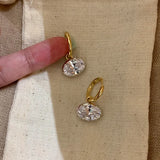 Elegant oval diamond pendant earrings with draped design for women, suitable for daily wear and gifts