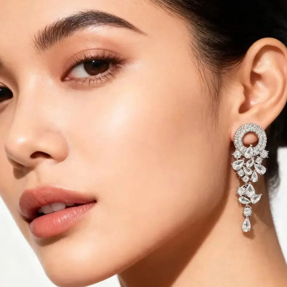 Elegant blue cubic zirconia drop earrings for women, featuring sparkling blue stones in a dangling design