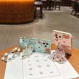 Pearl strap Love Bear phone holder case for iPhone, HSF Marketplace, shown from front and back