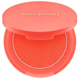 Rare Beauty moisturizing matte lipstick and natural powder blusher from HSF Marketplace, featuring portable makeup products with a smooth finish.