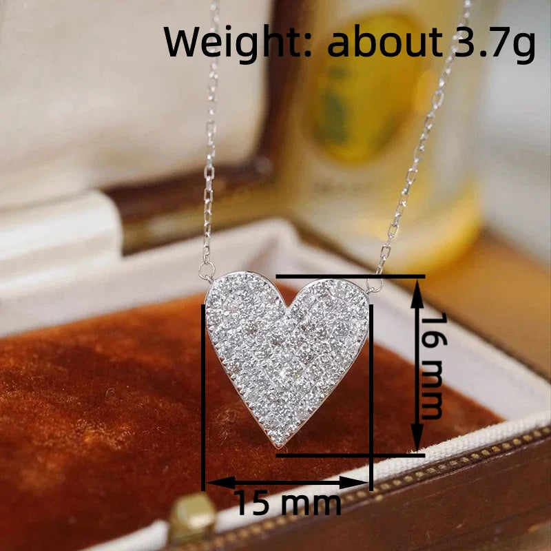 Huitan heart pendant necklace with sparkling CZ stones for women, delicate jewelry design