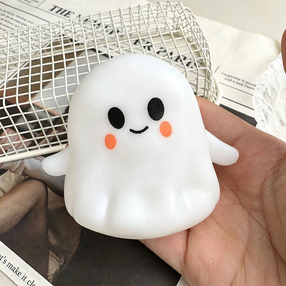 Coconut oil pumpkin ghost squishy toy by HSF Marketplace for sensory stress relief