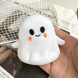 Coconut oil pumpkin ghost squishy toy by HSF Marketplace for sensory stress relief