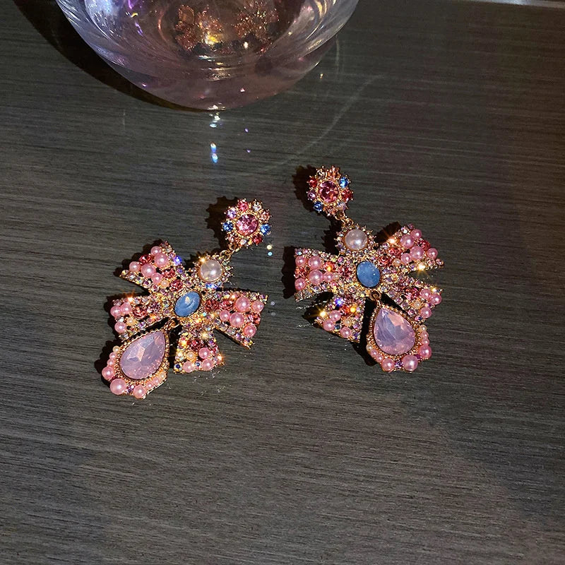 Pink crystal bowknot drop earrings for women, trendy statement jewelry by HSF Marketplace