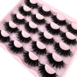 Pair of 10 sets of 3D faux mink wispy dramatic false eyelashes, thick volume 25mm strip lashes for a bold cat eye look.