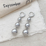 Punk metal round bead tassel pendant earrings for women, glossy smooth gold color ball jewelry by HSF Marketplace