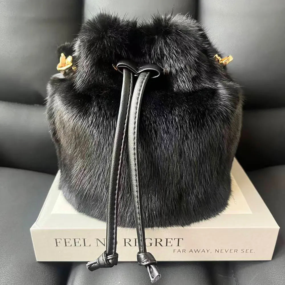 Real mink fur bucket handbag for women, luxurious fluffy crossbody bag with evening style, by HSF Marketplace.