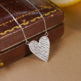 Huitan heart pendant necklace with sparkling CZ stones for women, delicate jewelry design