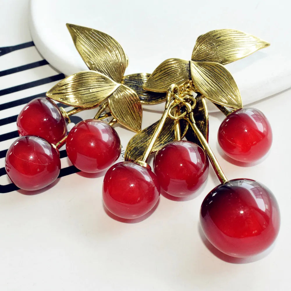 Vintage metal leaf and resin red cherry dangle earrings by HSF Marketplace