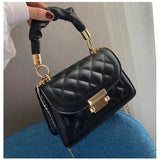 Luxury women's PU leather shoulder handbag with solid color design, small size, and elegant underarm style.