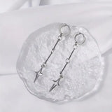 Classic star earrings, grunge y2k goth dangly jewelry with edgy punk fairy aesthetic and chunky star charms