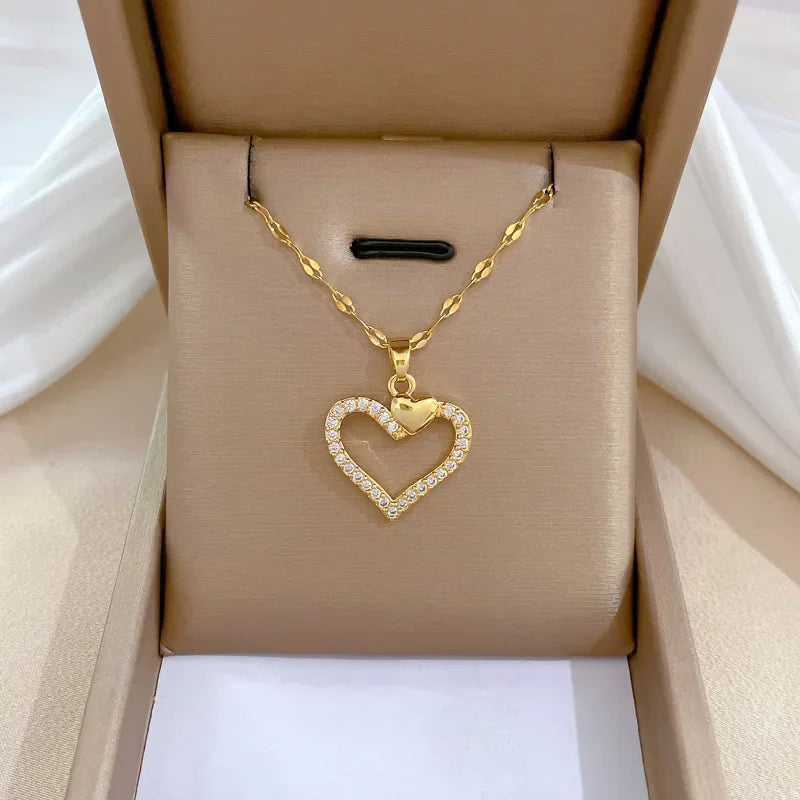 Heart-shaped stainless steel zirconia necklace for women and girls, gold color jewelry perfect for parties and daily wear.