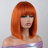 Orange blonde short straight bob wig with bangs, human hair, Brazilian silk base, styled by HSF Marketplace.