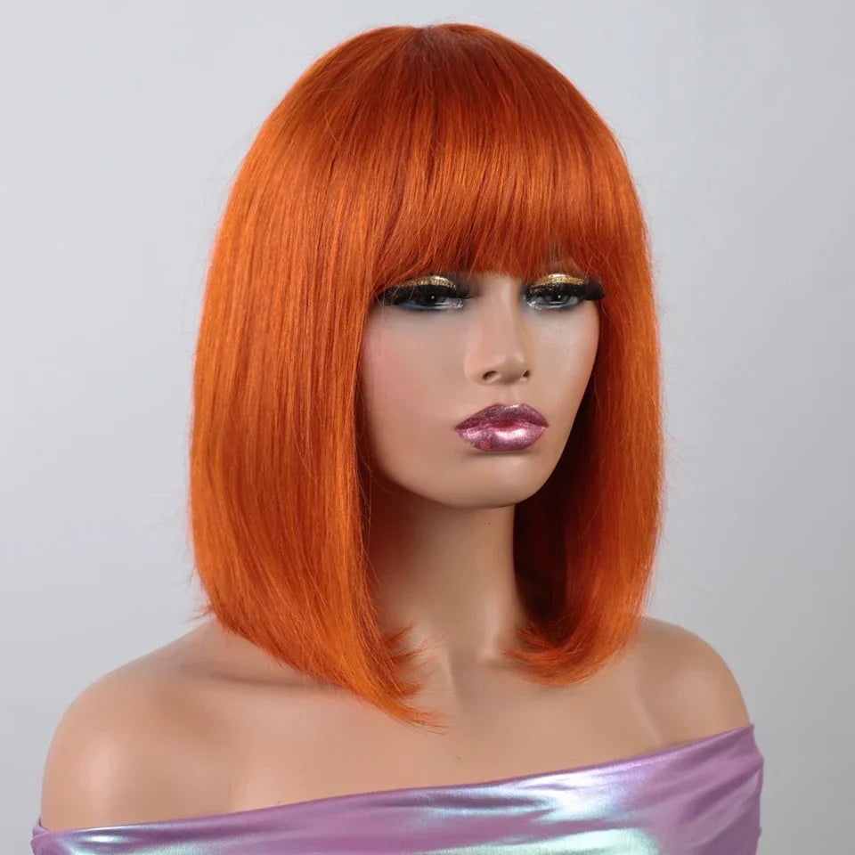 Orange blonde short straight bob wig with bangs, human hair, Brazilian silk base, styled by HSF Marketplace.