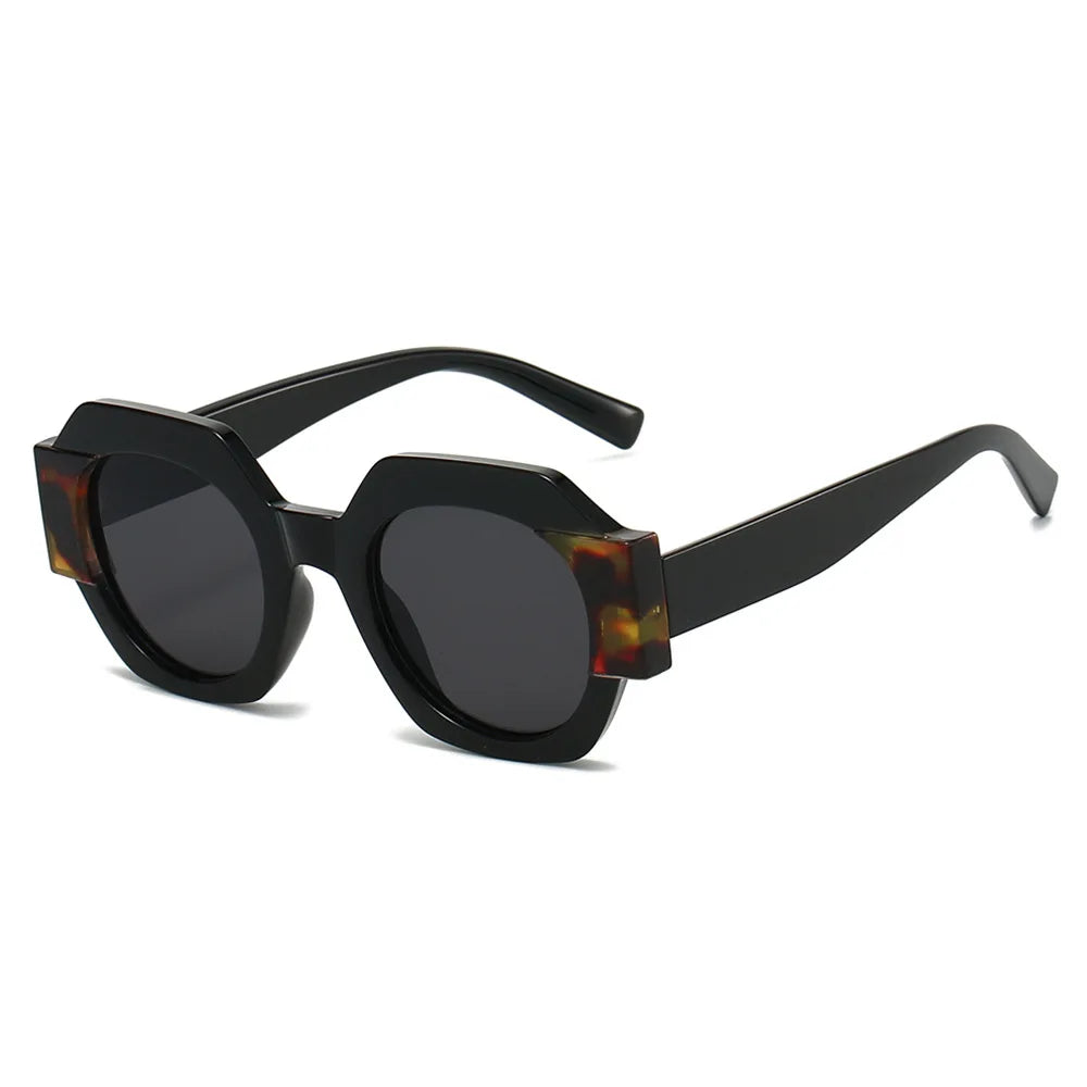 Hexagon-shaped designer sunglasses for women with colorful patchwork frames, casual travel eyewear by HSF Marketplace.