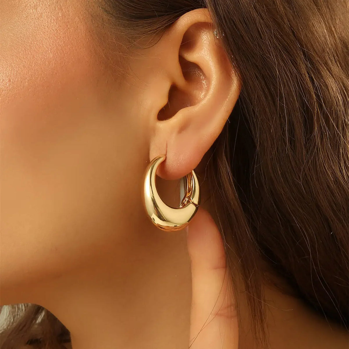 Stainless steel golden double-layer hollow flower hoop earrings for women, vintage floral jewelry design