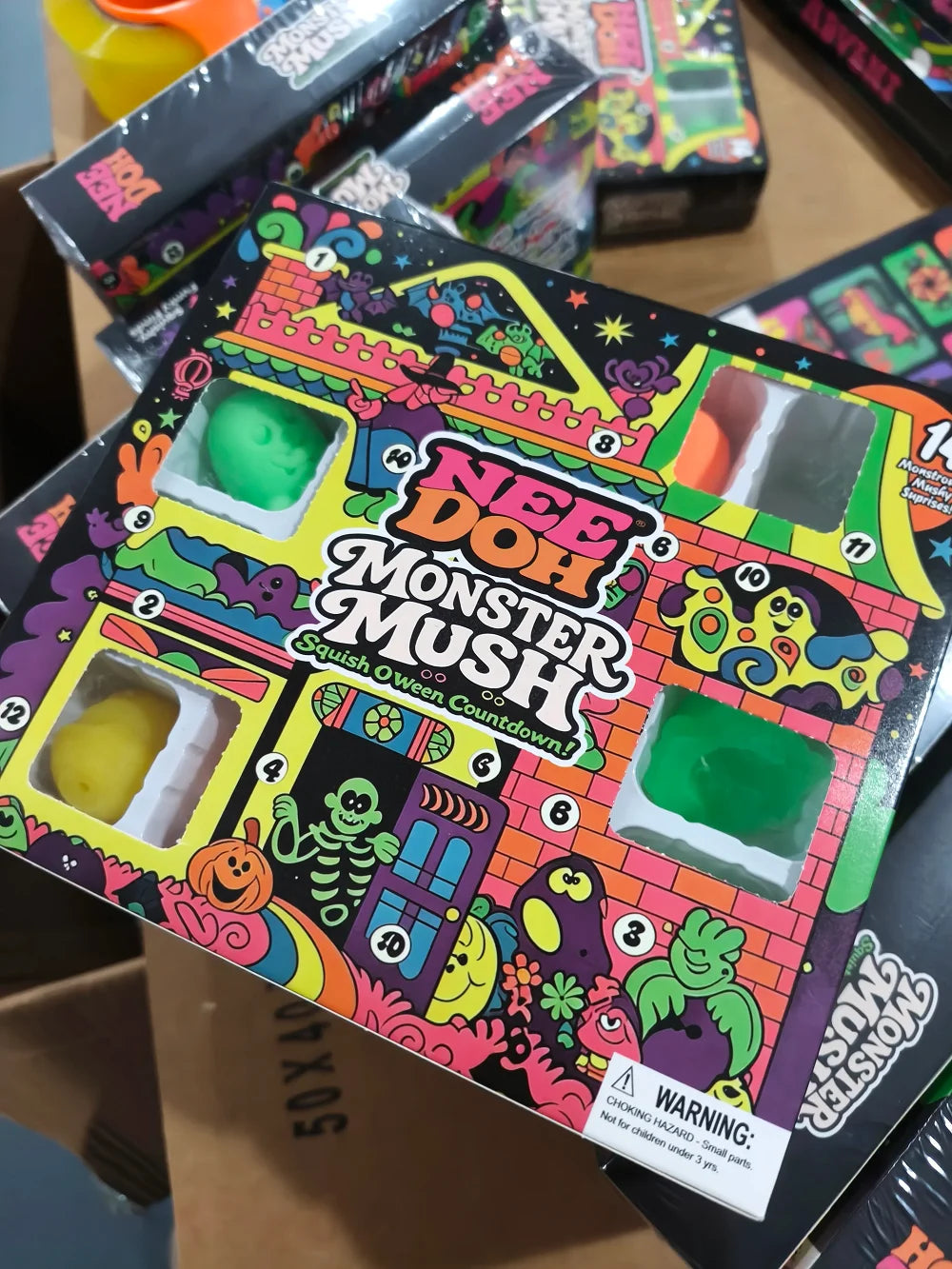 Hot Needoh Advent Calendar sensory squeeze toy with colorful surprise compartments for stress relief, family and friends' countdown fun.