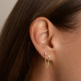 Luxury CZ double ear studs with tassel chains for women, featuring sparkling cubic zirconia and dangling chain accents