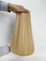 Ponytail human hair P18-1001 wrap-around extension in natural blonde shade, available in 60g and 100g weights