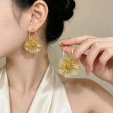 Golden vintage butterfly flower pendant earrings for weddings and parties