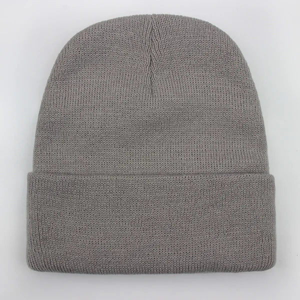 Unisex soft knitted winter beanie in women's hat style, available in 24 colors
