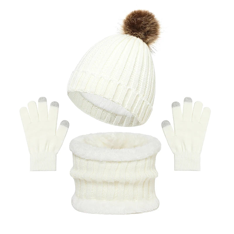 Women’s knitted winter hat, scarf, and gloves set in a warm outdoor style