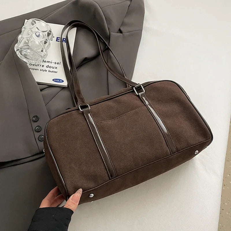 Brown suede large casual shoulder bag for women, retro design with spacious interior, ideal for autumn and winter commuting.