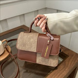 Elegant women's crossbody handbag by HSF Marketplace featuring a geometric pattern and snap closure, ideal for everyday fashion.