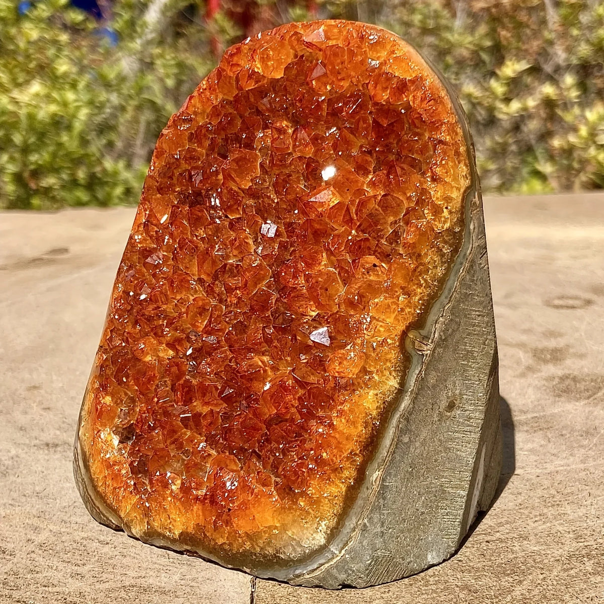 Orange quartz crystal cluster from HSF Marketplace, featuring vibrant mineral stones suitable for home or office decorative display.