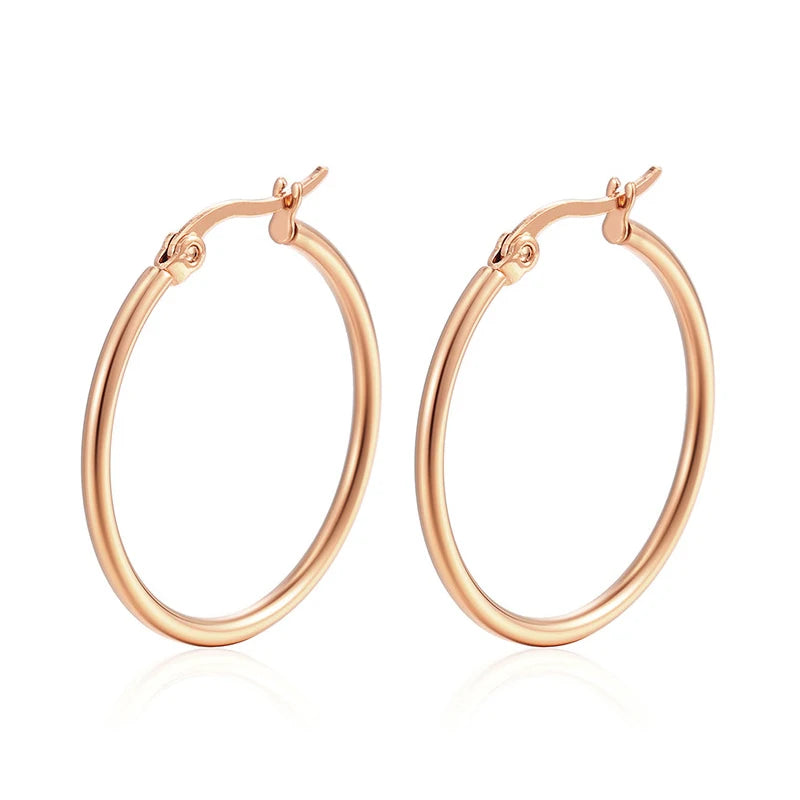 Classic stainless steel hoop earrings for women, available in 30–80mm sizes