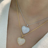Huitan sparkling heart pendant necklace with cubic zirconia, elegant jewelry for women, perfect for weddings and special occasions.