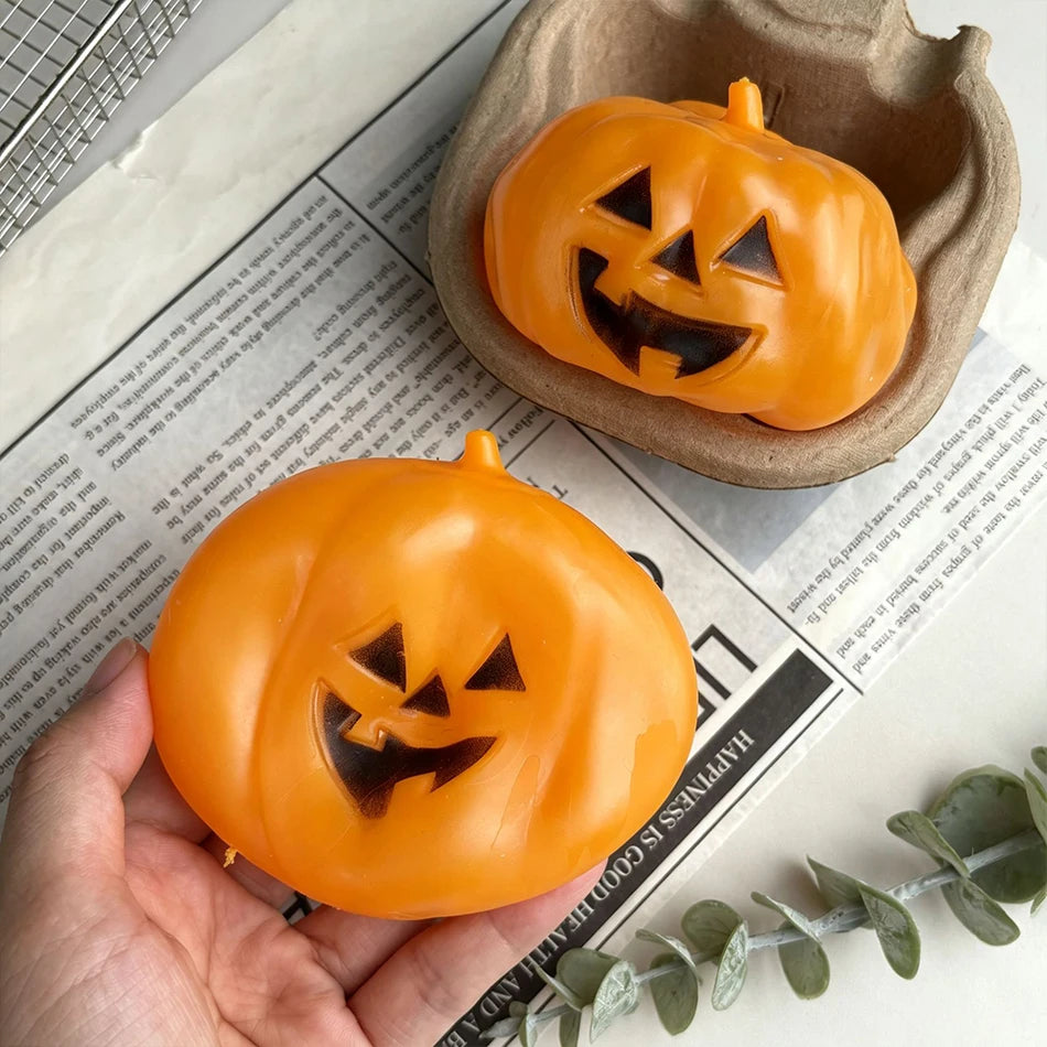 Coconut oil pumpkin ghost squishy toy by HSF Marketplace for sensory stress relief