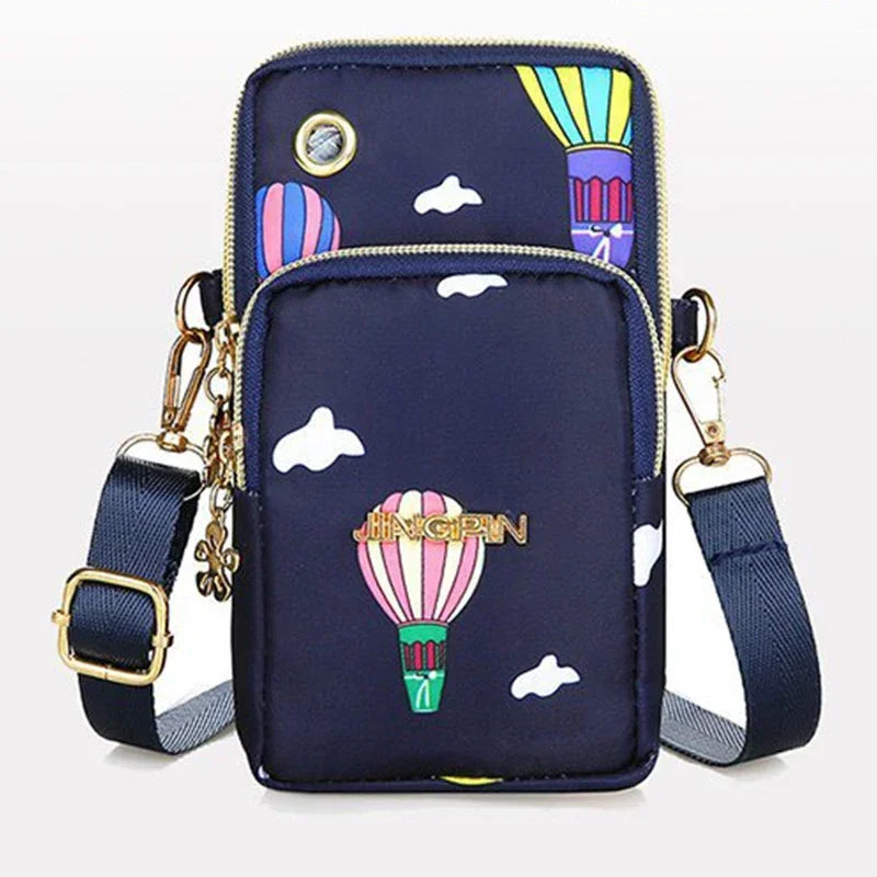 Women's crossbody handbag by HSF Marketplace featuring a mini coin bag with three compartments and shoulder strap.