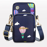 Women's crossbody handbag by HSF Marketplace featuring a mini coin bag with three compartments and shoulder strap.
