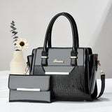High-quality black PU leather messenger bag for women, luxury designer shoulder crossbody purse with spacious interior.