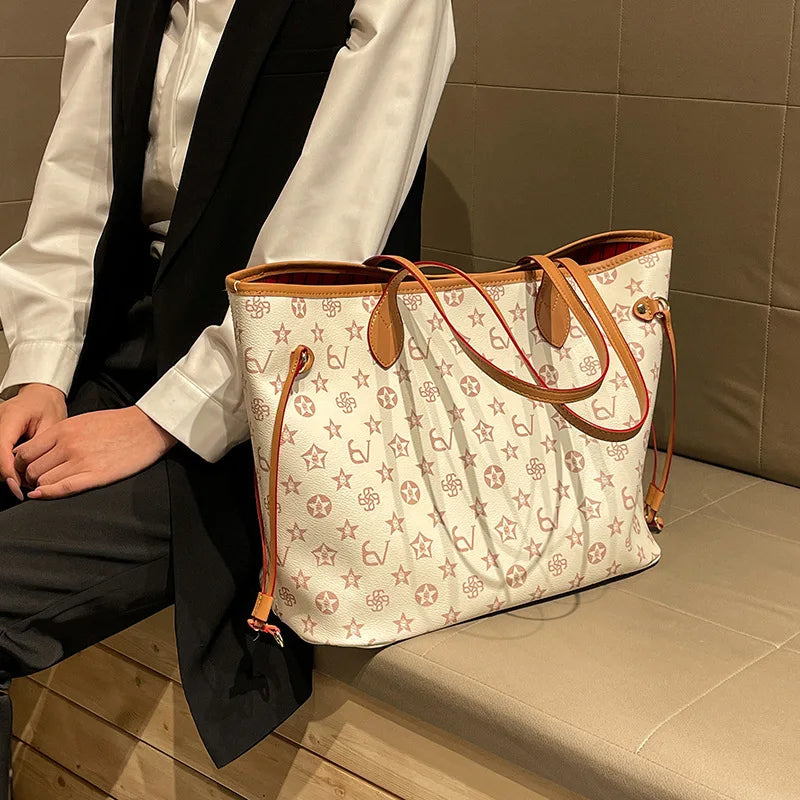 Elegant leather diaper bag by HSF Marketplace, Paris designer crossbody handbag with large capacity and classic tote style for women.
