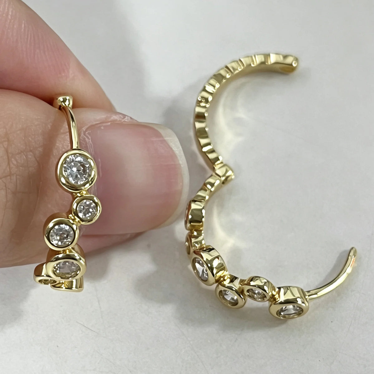 14K gold moissanite bubble hoop earrings by HSF Marketplace, elegant close-up jewelry design