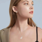 Shiny stainless steel initial letter pendant necklace for women with a sleek clavicle chain choker style jewelry.