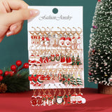 Festive Christmas dangle earrings with snowman and elk designs by HSF Marketplace