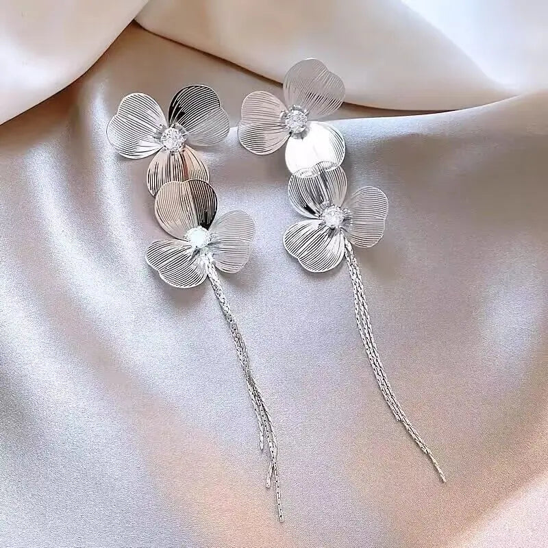 Trendy flower drop earrings with long tassels and rhinestones by HSF Marketplace