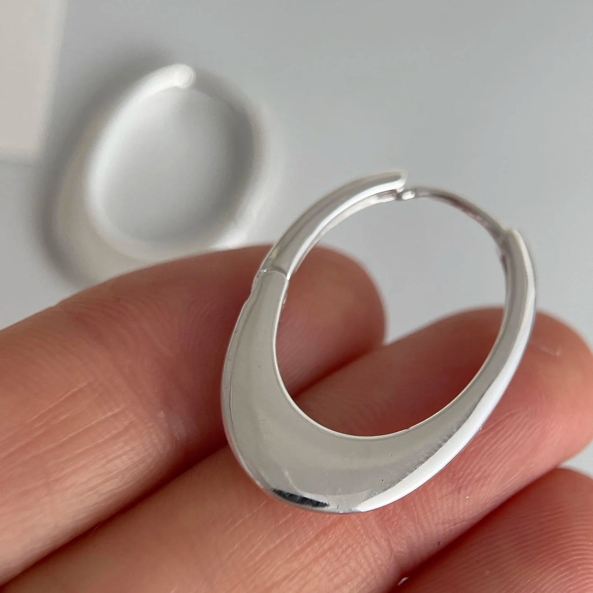 925 sterling silver oval hoop earrings for women, big hollow design, shiny finish and allergy-friendly jewelry