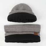 Women's winter scarf hat glove set with warm plush lining, shown together in matching cold-weather accessories.