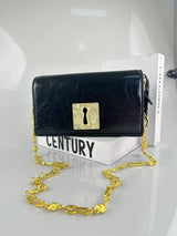 Elegant women's handbag featuring a retro copper gold-plated geometric necklace design, stylish European and American fashion trend.
