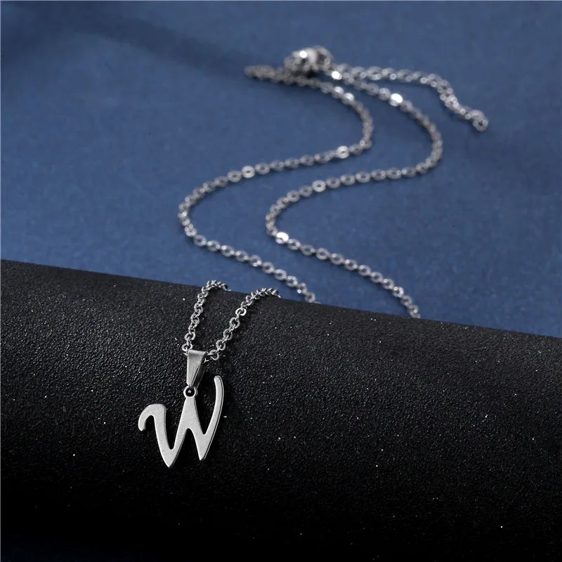 Stylish stainless steel initial letter pendant necklace for women, featuring a glossy, simple chain choker jewelry design.